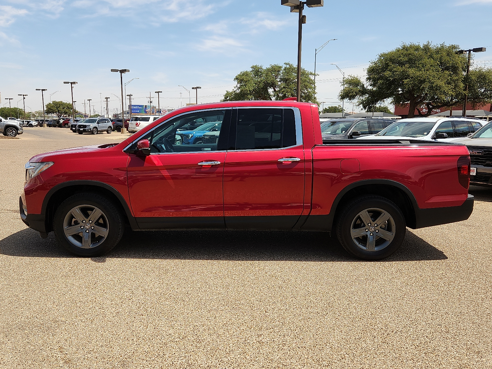 Radiant Red 2023 Honda Ridgeline RTL-E AWD Pickup Truck All-Wheel Drive 9-Speed Automatic