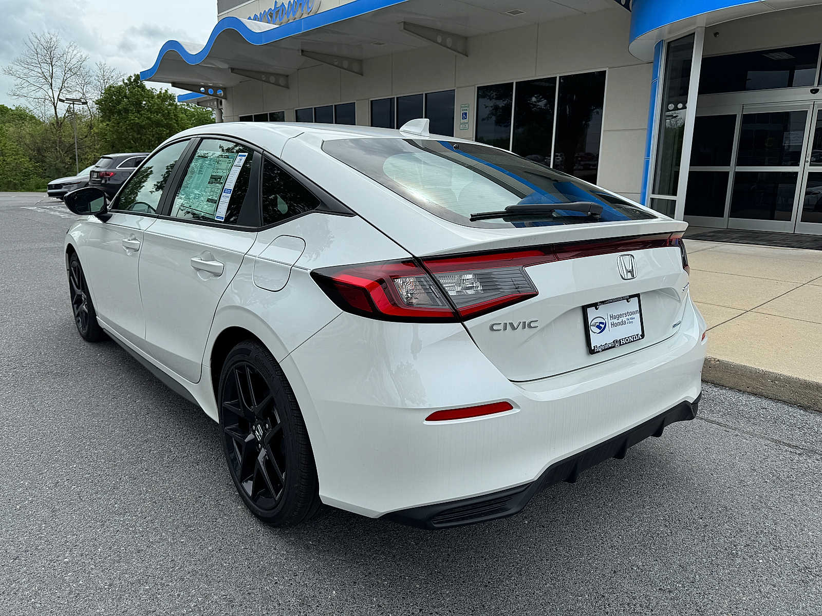 new 2025 Honda Civic Hatchback Hybrid car, priced at $31,755