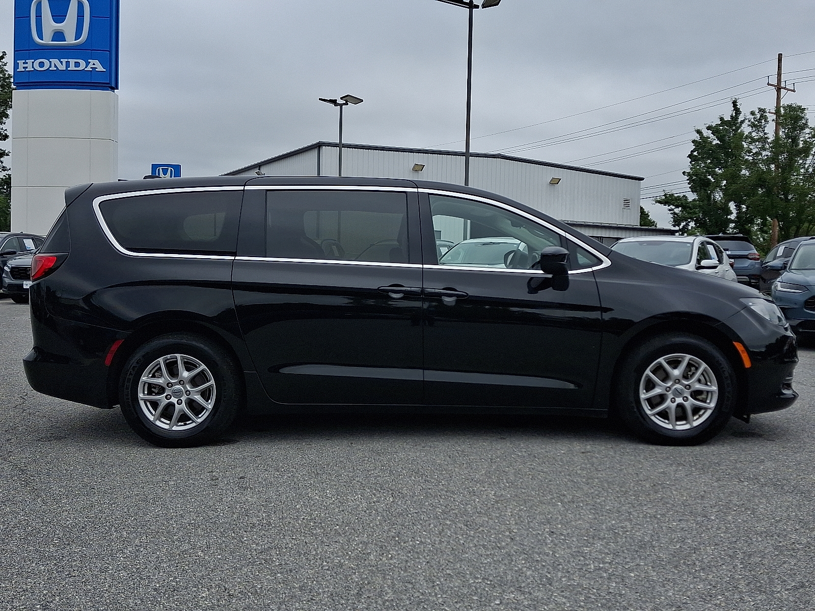 used 2024 Chrysler Voyager car, priced at $23,499